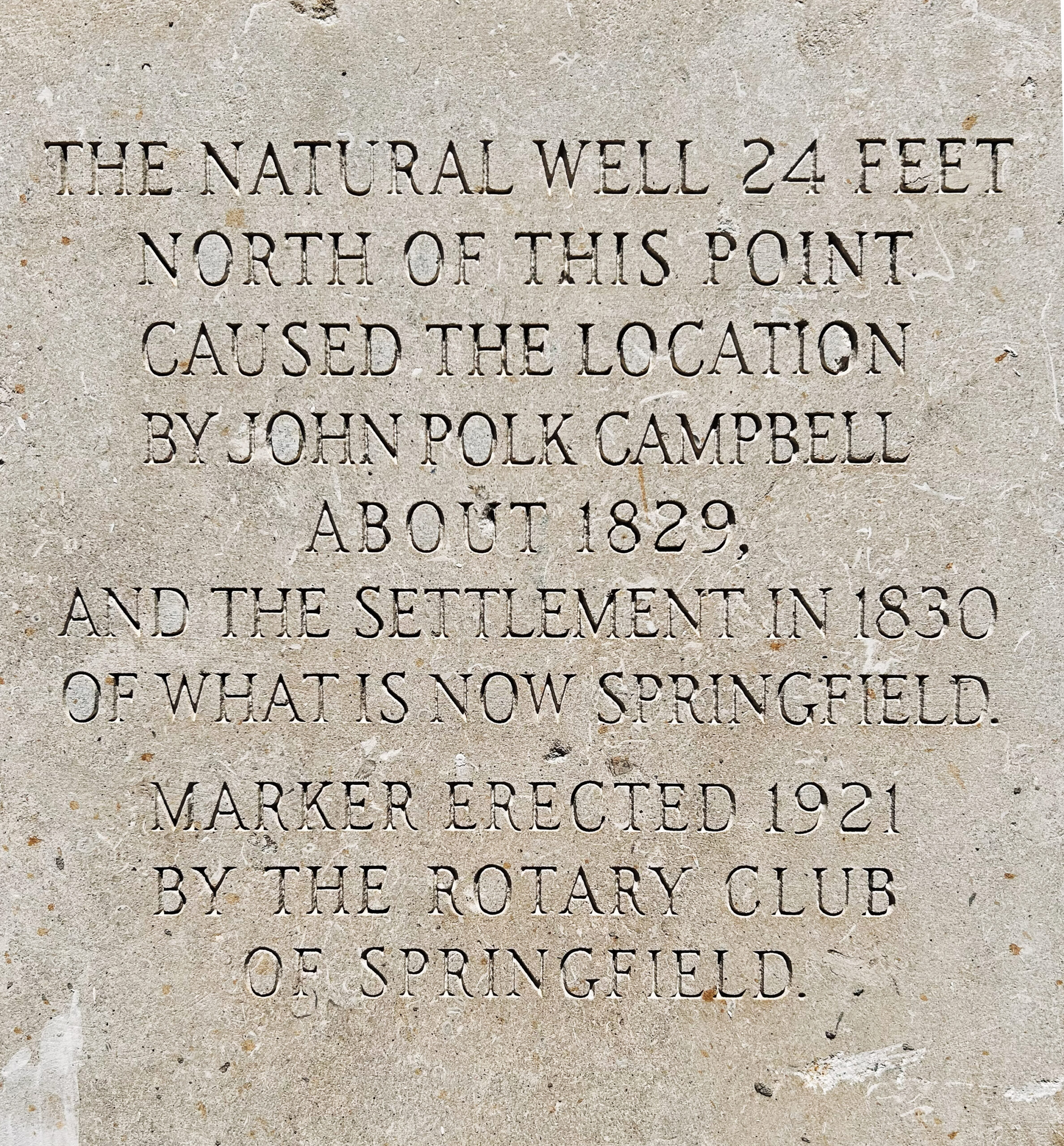 A plaque on the National Audio Company building at 309 E. Water Street reads: "The natural well 24 feet north of this point caused the location by John Polk Campbell about 1829, and the settlement in 1830 of what is now Springfield."
