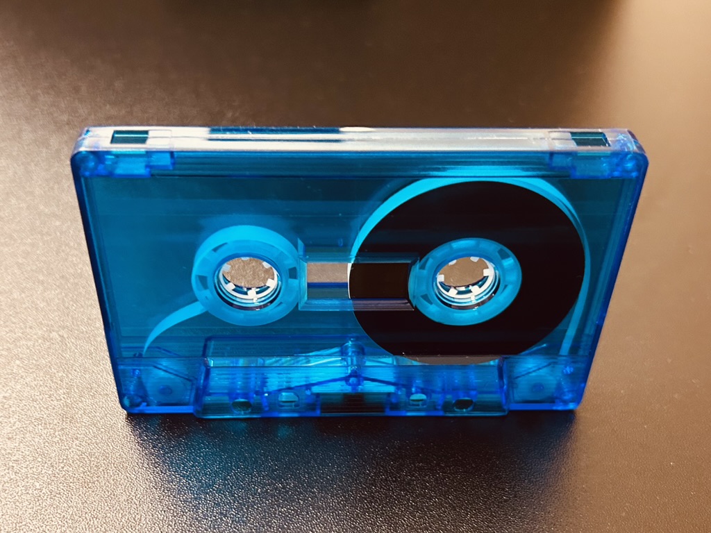 The cassette cartridge allows music lovers to carry their favorite artists with them. It protects the cassette tape and preserves audio fidelity while enabling easy transport.