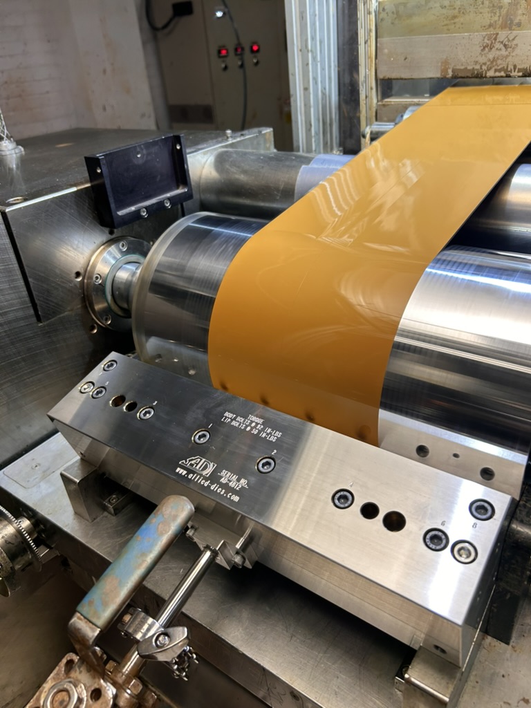 National Audio Company just installed a new slot die to more uniformly coat the polyester film, an important part of the cassette manufacturing process